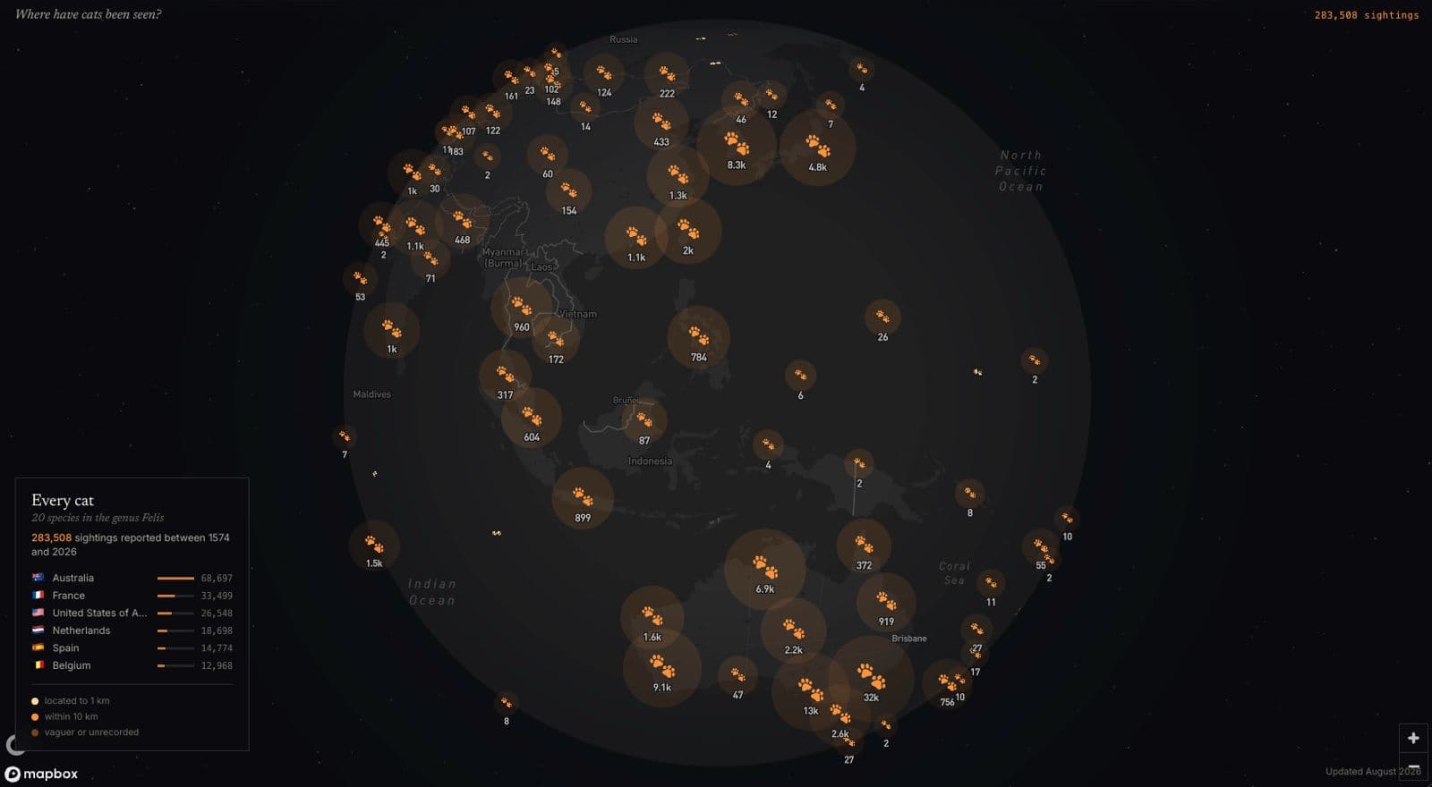 Recorded Felis occurrences clustered across a dark globe, rendered as paw prints